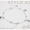 Pulsera veneziana con bolita y dijes corazon engarzados.